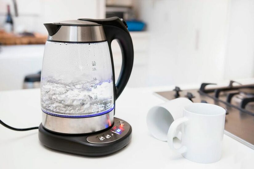Electric kettle with the necessary amount of water.